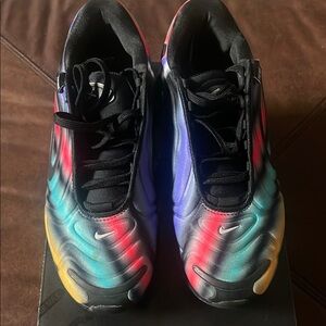 Nike Kids Sneakers in Red, Blue, and Black